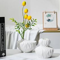 Vase forme en huit avec vagues10 x 10 cm céramique blanc